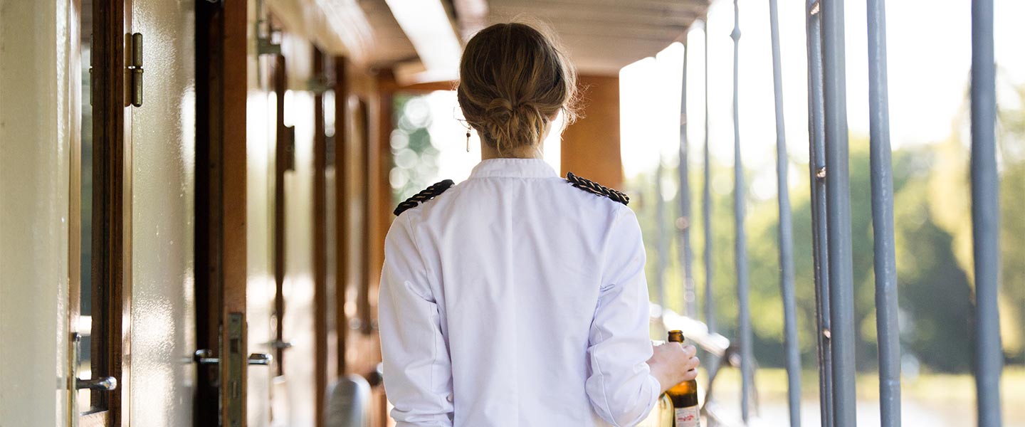 Person onboard a canal cruise ship.
